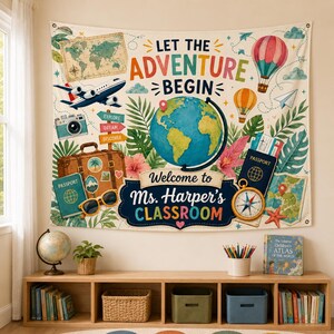 May include: A rectangular fabric wall tapestry featuring the text Let the Adventure Begin and Welcome to Ms. Harper's Classroom. The design includes a globe, a vintage suitcase, a passport, a camera, an airplane, hot air balloons, and tropical leaves.