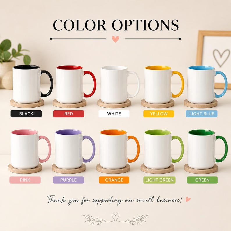 May include: A collection of ten ceramic mugs arranged in two rows, each featuring a white exterior and a distinct colored interior and handle. The colors include black, red, white, yellow, light blue, pink, purple, orange, light green, and green.