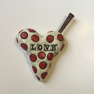 Ceramic Heart with Rusty nail