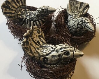 One Ceramic Bird in a Nest