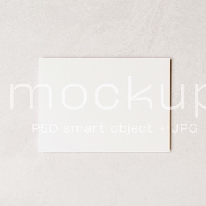 May include: A white blank card mockup on a light gray textured background.  The card is a PSD smart object and JPG.