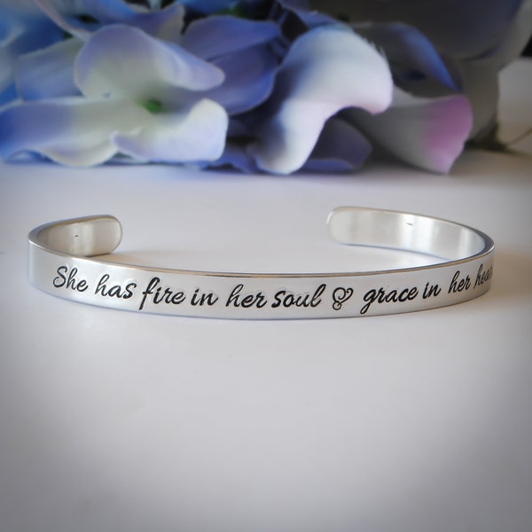 Stamped Metal Bracelet "She has fire in her soul and grace in her heart"