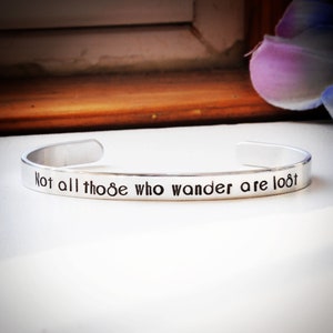 Stamped Metal Bracelet &quot;Not all those who wander are lost&quot;