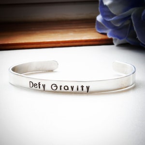 Defy Gravity Stamped Metal  Bracelet