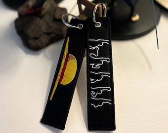 SPEND EUR12 = FREE SHIPPING  Anime Embroided Jet Tag Keychain Reverse