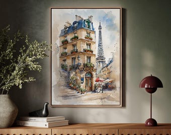Könnte beinhalten: Aquarellmalerei einer Pariser Straßenszene mit einem Gebäude und dem Eiffelturm im Hintergrund. Das Kunstwerk ist gerahmt und auf einem Holzschrank ausgestellt, zusammen mit einer dekorativen Lampe und einer Vase.
