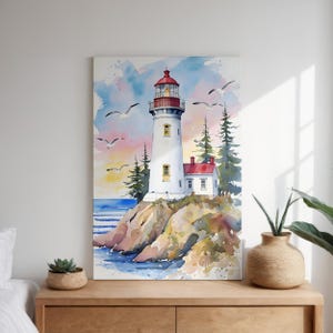 Watercolor canvas print of a lighthouse on a rocky cliff with seagulls flying in a pastel sunset sky.