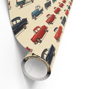 May include: A seamless pattern featuring vintage cars in red, blue, and green on a cream background. The cars are all facing the same direction and are arranged in a repeating pattern.