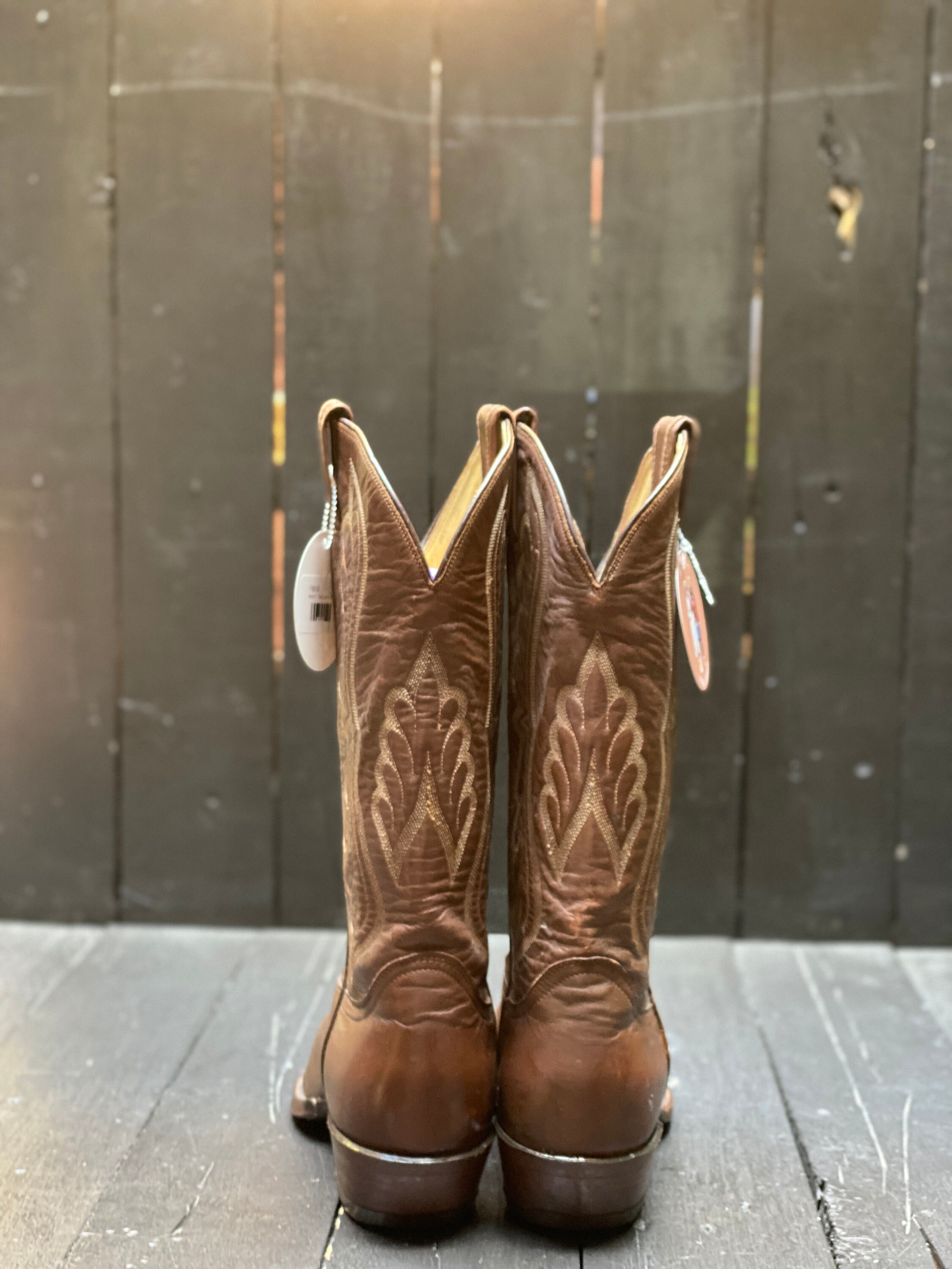 Cowboy boots with clearance tread