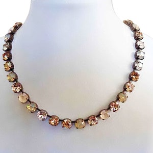 Swarovski crystal 8mm fancy stone necklace golden and gray tones  ,antique brass plated