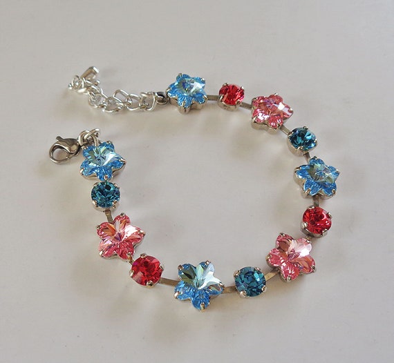 Swarovski ブレスレット フラワーモチーフ アクアマリン￼ 調整可能 Swarovski crystal flower design bracelet, light rose and