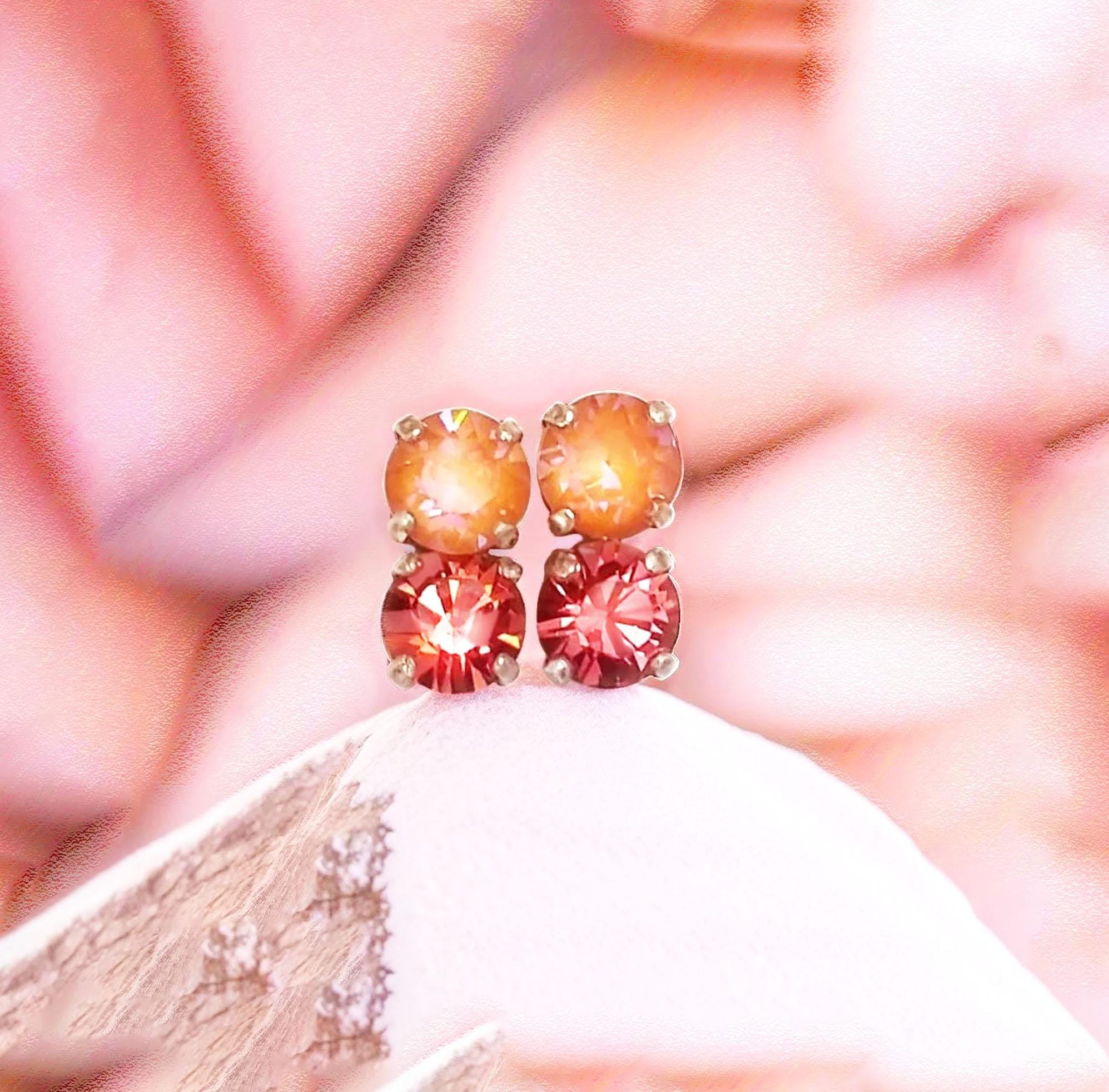 Orecchino singolo bagnato in oro con cristalli in Rosa