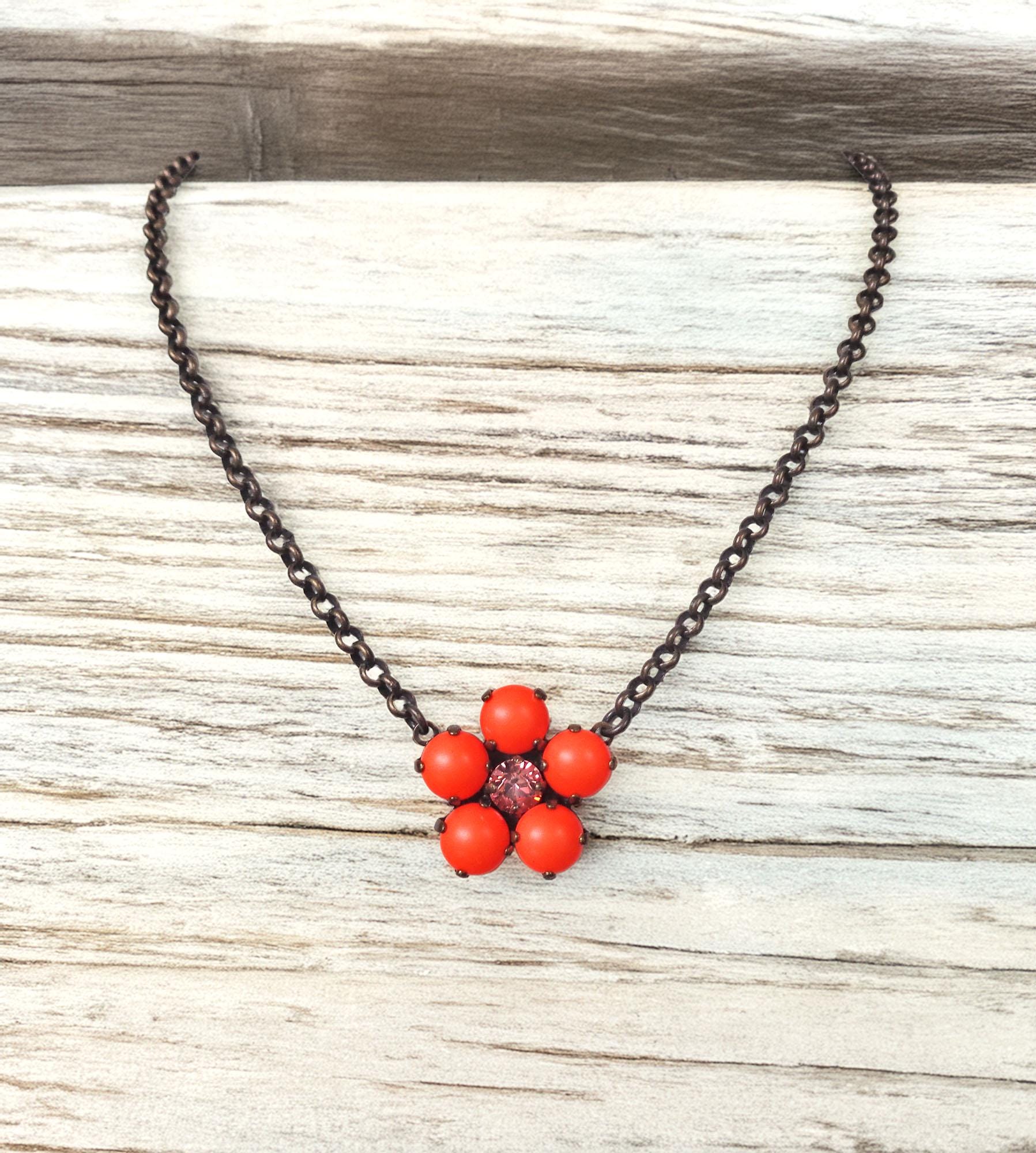 Swarovski crystal flower pendant with neon orange pearls ,antique