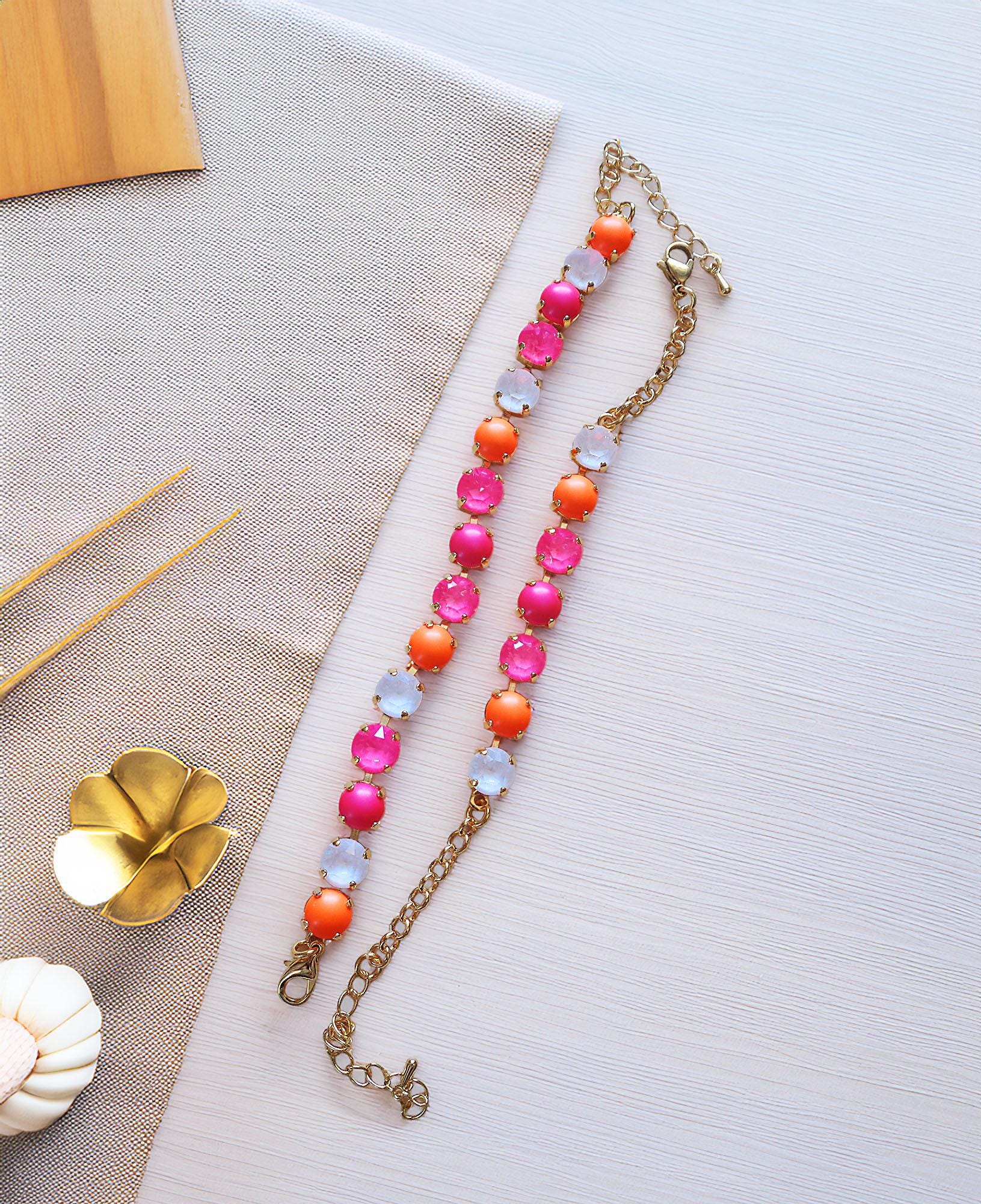 Swarovski crystal and pearls bracelet neon pink ,neon orange,gold