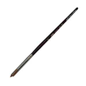 May include: A single, angled paintbrush with a dark brown handle and a silver ferrule. The brush head is a light brown color. The text "maërs FRANCE ART 110" is printed on the handle.