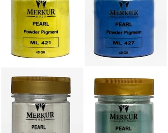 May include: Four jars of Merkur Gold Pearl Powder Pigment in yellow, blue, white, and teal. Each jar has a gold lid and a label with the product name, color code, and 40-gram weight. The jars are labeled ML 421, ML 427, ML 10100, and ML 408.