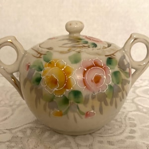 Floral sugar bowl with lid