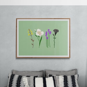 May include: A bedroom featuring a bed, a wooden ladder, a mirror, and a framed print depicting five flowers on a green background.