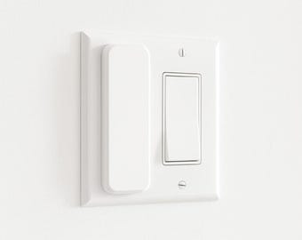 Protector de cubierta de interruptor de luz magnético