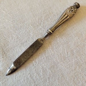 Antique Victorian nail file with sterling silver handle