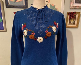 Vintage blue acrylic knit sweater with floral embroidery • by Society • size medium