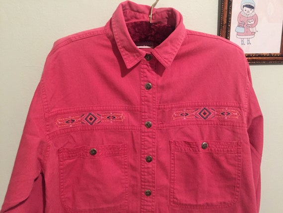 rose color shirt