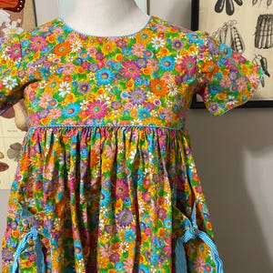 Vintage girl’s  floral dress with pockets