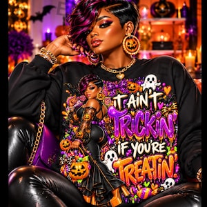 May include: A black long-sleeve sweatshirt featuring a graphic print of a person with purple-streaked hair, wearing a pumpkin-themed outfit, surrounded by ghosts, pumpkins, and the text IT AINT TRICKIN IF YOU'RE TREATIN in purple and orange.
