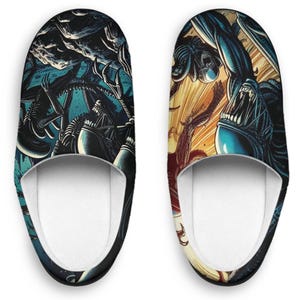 May include: A pair of black and white slippers with a graphic print of an alien creature. The slippers have a white interior and a black exterior.