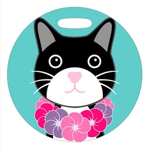 May include: A black and white cat with a pink nose wearing a pink and purple flower lei on a turquoise background.