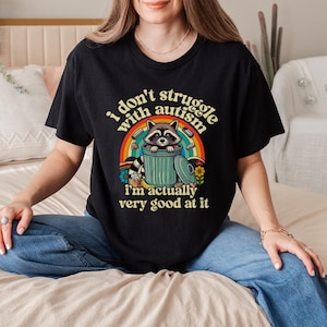 Funny I Don’t Struggle With Autism Autistic Raccoon Meme T-Shirt, Cute Neurodiversity Shirt, Retro Graphic Tee, Gift For Autism Pride