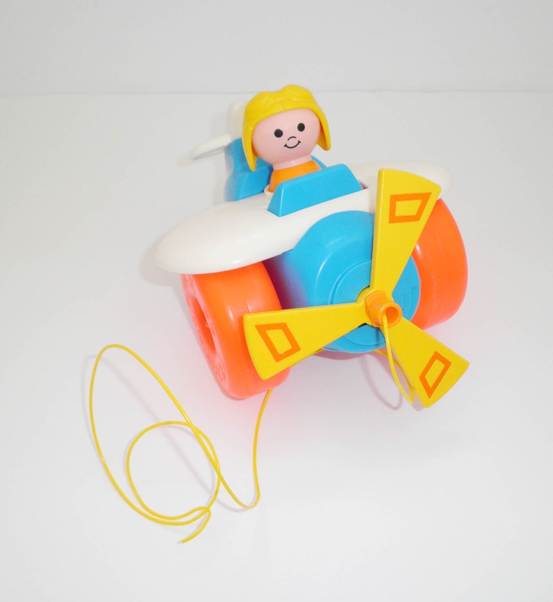 Nostalgic 1980/'s Fisher Price pull along vintage AIRPLANE toddler plane toy with pilot