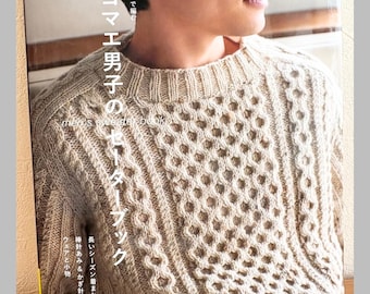 May include: A craft book cover featuring a person wearing a beige, long-sleeved, cable-knit sweater with a crew neckline. The cover includes Japanese text, the English phrase "Let's knit series," and "men's sweater book" printed on the front.