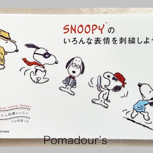 Snoopy, Peanuts i przyjaciele z haftem przedstawiającym różne mimiki twarzy – japońska książka o rękodziele