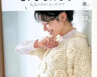 May include: A craft magazine titled the crochet time No. 03, featuring a cream-colored crocheted top with a textured floral pattern. The cover displays the text applemints, the crochet time, and Japanese characters, showcasing a garment with short sleeves and a high neckline.