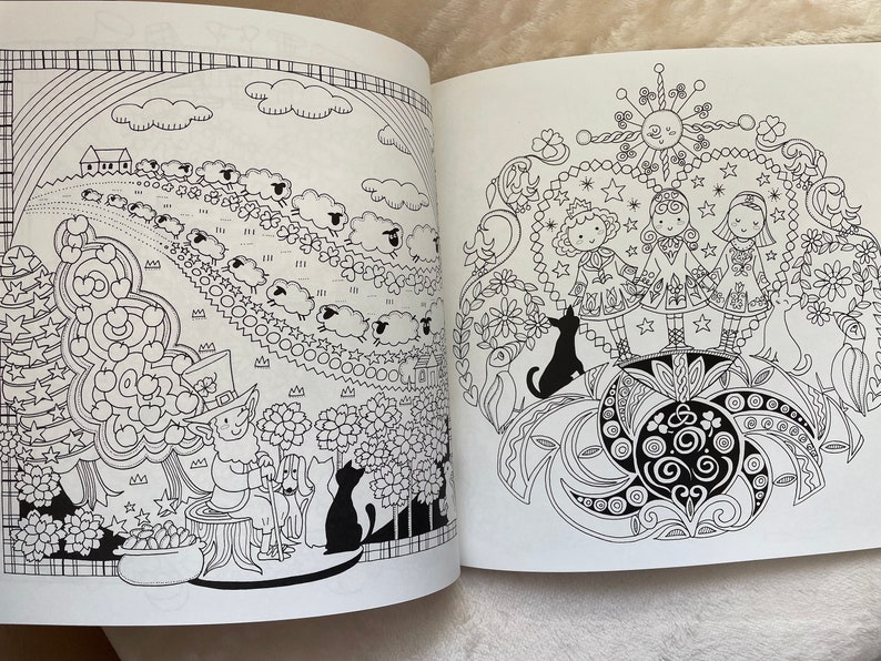 May include: A black and white coloring book page with two illustrations. The left side features a leprechaun with a pot of gold and a flock of sheep. The right side features three girls in dresses and a black cat.