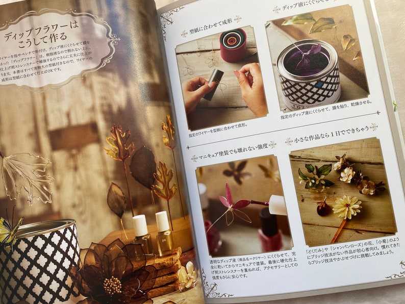 May include: A book with instructions on how to make dip flowers. The book features photos of various flowers made with the dip technique. The text on the page reads "Dip flowers are made this way".