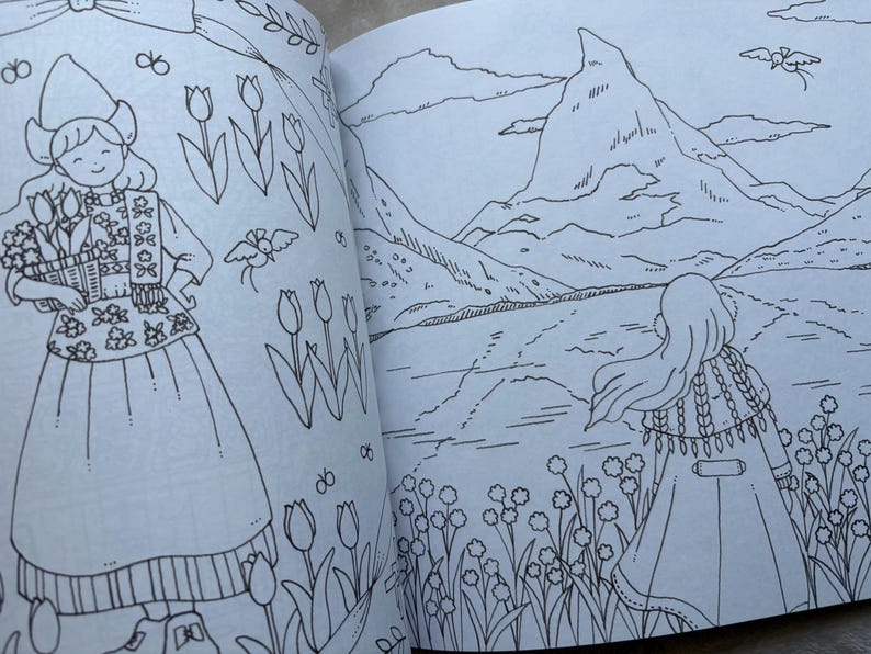 May include: A coloring book spread featuring two detailed illustrations. One shows a person in traditional Dutch attire holding flowers, surrounded by tulips. The other depicts a person looking at a mountain landscape with flowers.