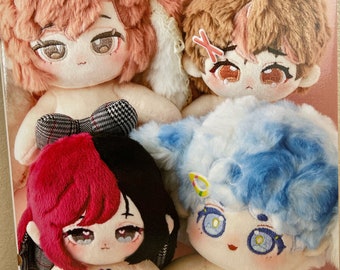 May include: A book cover featuring four plush toys with embroidered faces. The book title is "推しぬいのお顔刺しゅう" which translates to "Embroidered Faces of Plush Toys". The book cover also includes the text "目が最強にかわいい" which translates to "Eyes are the strongest and cutest".