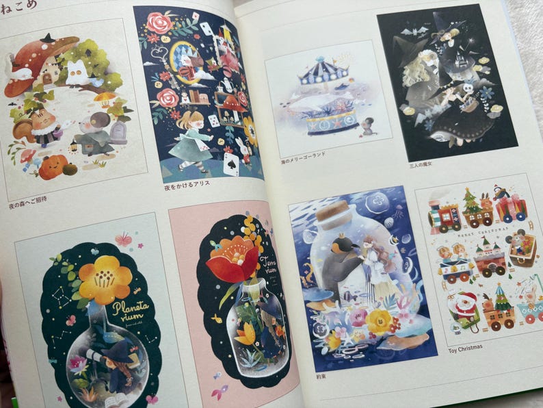 May include: A spread from a book featuring several colorful illustrations. The images include whimsical scenes with characters, flowers, and a carousel. Text in Japanese and English is visible, including "Toy Christmas" and "Planeta vium."