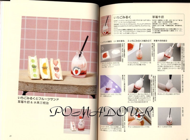 May include: A close-up of a miniature strawberry milk bottle and three miniature fruit sandwiches. The sandwiches are filled with fruit and have a pink, white, and green color scheme. The bottle is pink and white with a red strawberry on the front. The text "HONJIGO CAFE" is printed on the sandwiches.