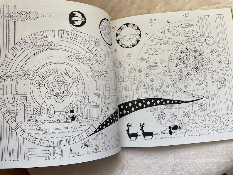 May include: A black and white coloring book page with illustrations of a city scene, a forest scene, and a reindeer. The city scene includes buildings, trees, and a car. The forest scene includes trees, flowers, and a house. The reindeer are pulling a sleigh.