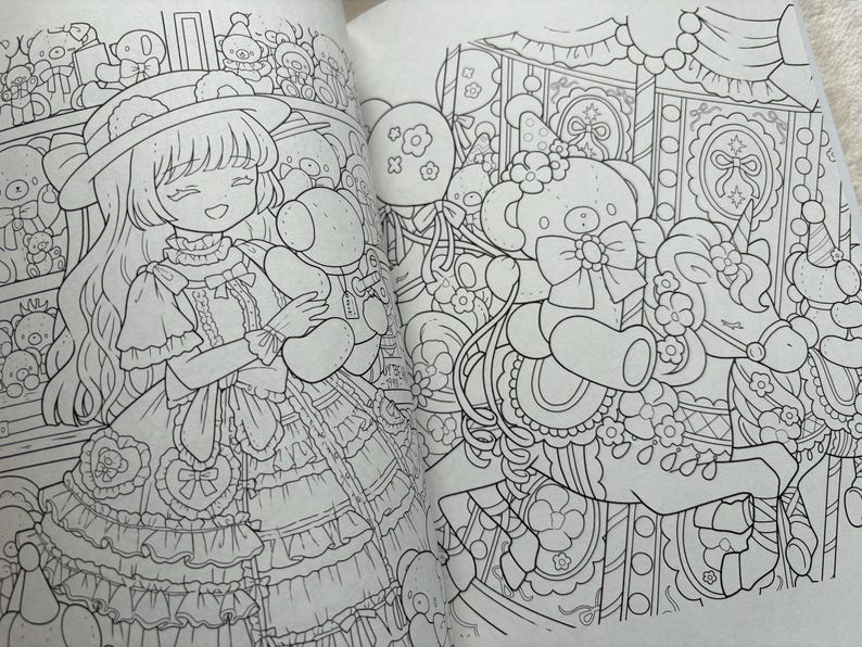 May include: Black and white illustration of a coloring book page featuring a smiling girl in a dress and hat, holding a teddy bear. The page also shows a carousel with a teddy bear and unicorn.