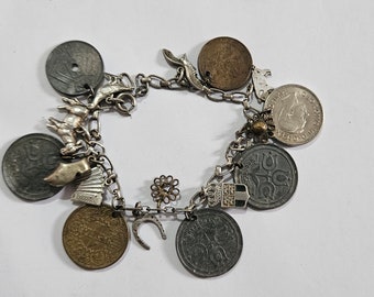 Vintage ww2 1940s plata de ley y pulsera de encanto de monedas mixtas