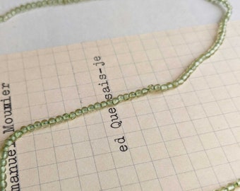 Green Peridot round beads - smooth - natural stones - 2mm - 10 inch strand - ivory white - 125 beads