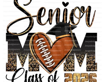 May include: Gold glitter text that reads "Senior Mom Class of 2026" with a black and brown football-shaped heart in the centre. The heart has white stitching and a black graduation cap on top.