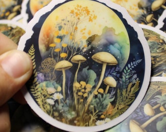 May include: A round sticker with a watercolor illustration of mushrooms and flowers in a forest setting. The background is a dark blue with a yellow moon and stars.