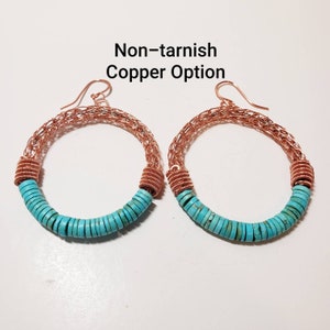 May include: A pair of copper hoop earrings with turquoise beads. The earrings are made of non-tarnish copper and have a woven wire design.  Non-tarnish Copper Option.