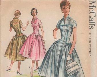 McCall's 3694  Fitted Elongated Bodice w/ Full Side Skirts Bust 32 ©1956