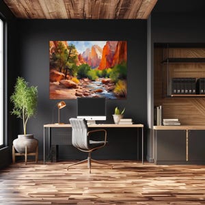 May include: An office space featuring a large landscape painting of a canyon with a river. The painting is above a desk with a computer, lamp, and chair. A potted plant sits to the left of the desk, and a wooden cabinet is to the right.